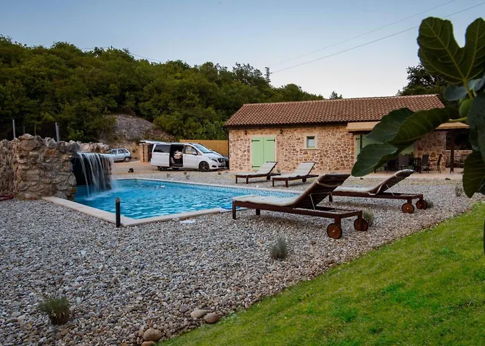 Viletta With Pool, Waterfall, Privacy, Large Garden - By Traveler Tourist Agency Krk - Id 2212 Holiday home Vrbnik (Primorje-Gorski Kotar)